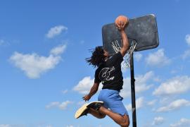 Camper Playing Basketball