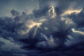 Thunderstorm clouds and lightning