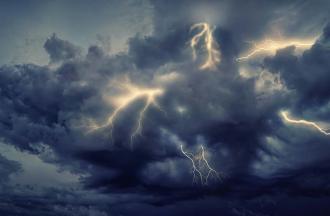 Thunderstorm clouds and lightning