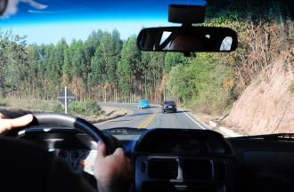 Driver with others cars visible through windshield