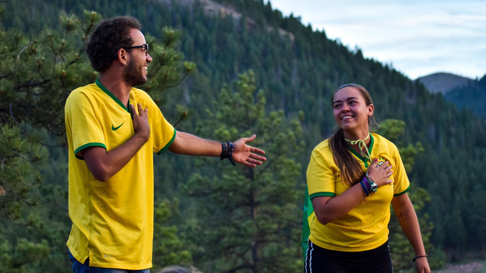 Two staff smiling