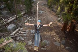 Camper on a zipline at Golden Arrow Camp in Clovis, CA