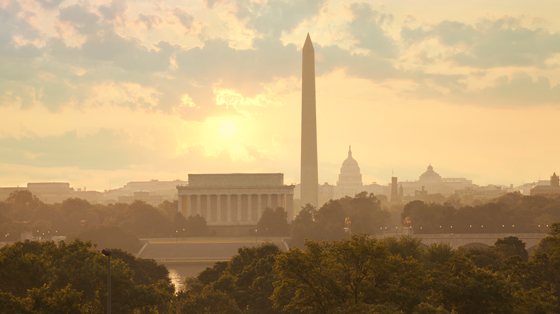 Washington DC skyline with sun and clouds in the morning